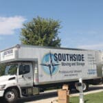 IMG_5343 A white truck with the words " southside moving and storage ".