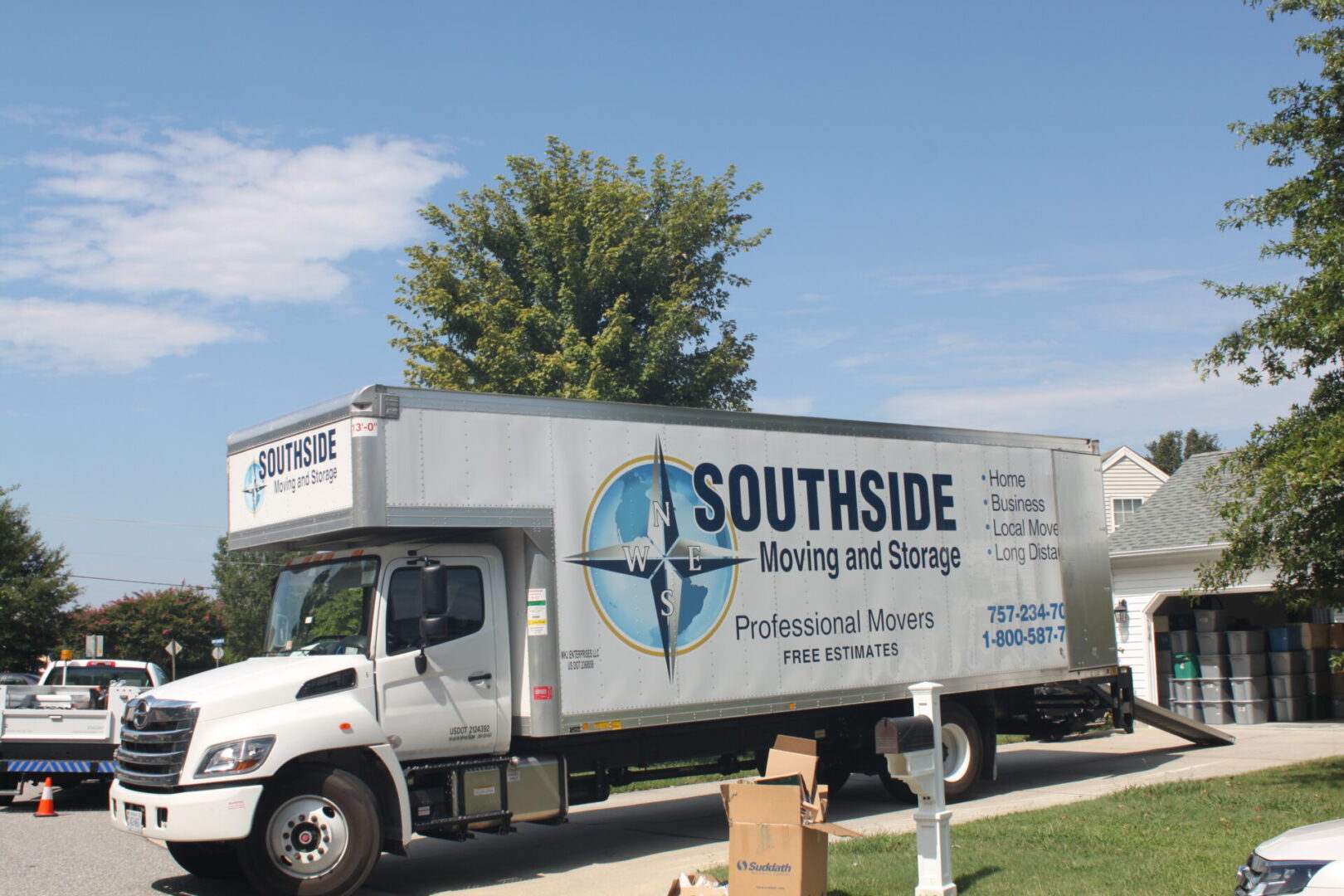 A white truck with the words " southside moving and storage ".