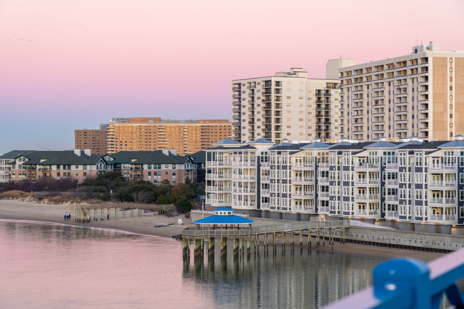 A view of buildings and water from the pier.