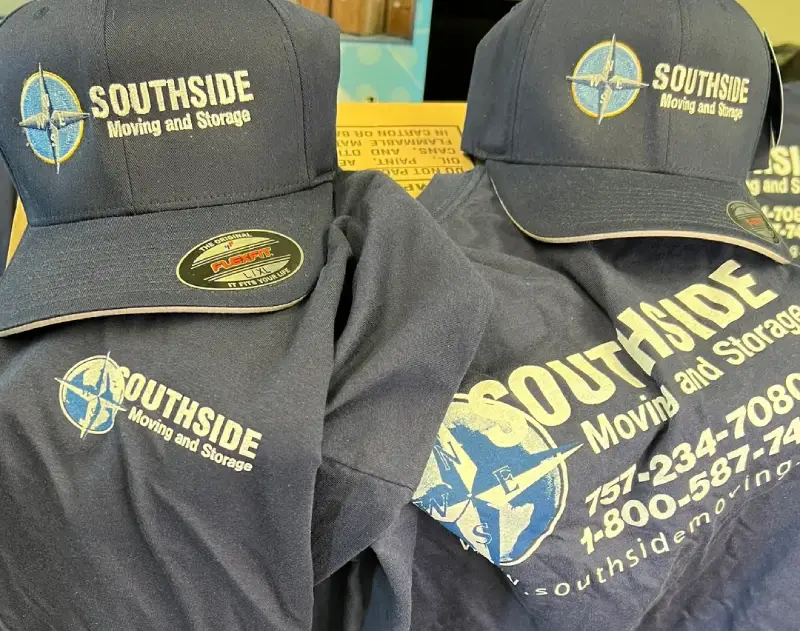 A close up of several hats and shirts