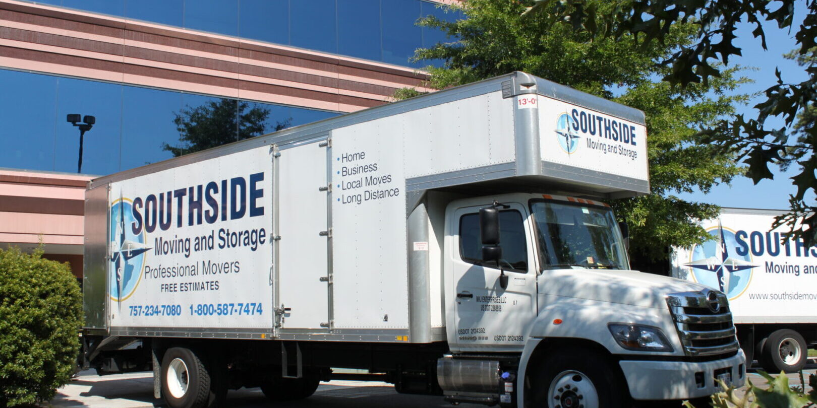 A white truck with the words " southside moving and storage ".